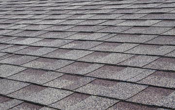 Cowbit tiles for shallow pitch roofing
